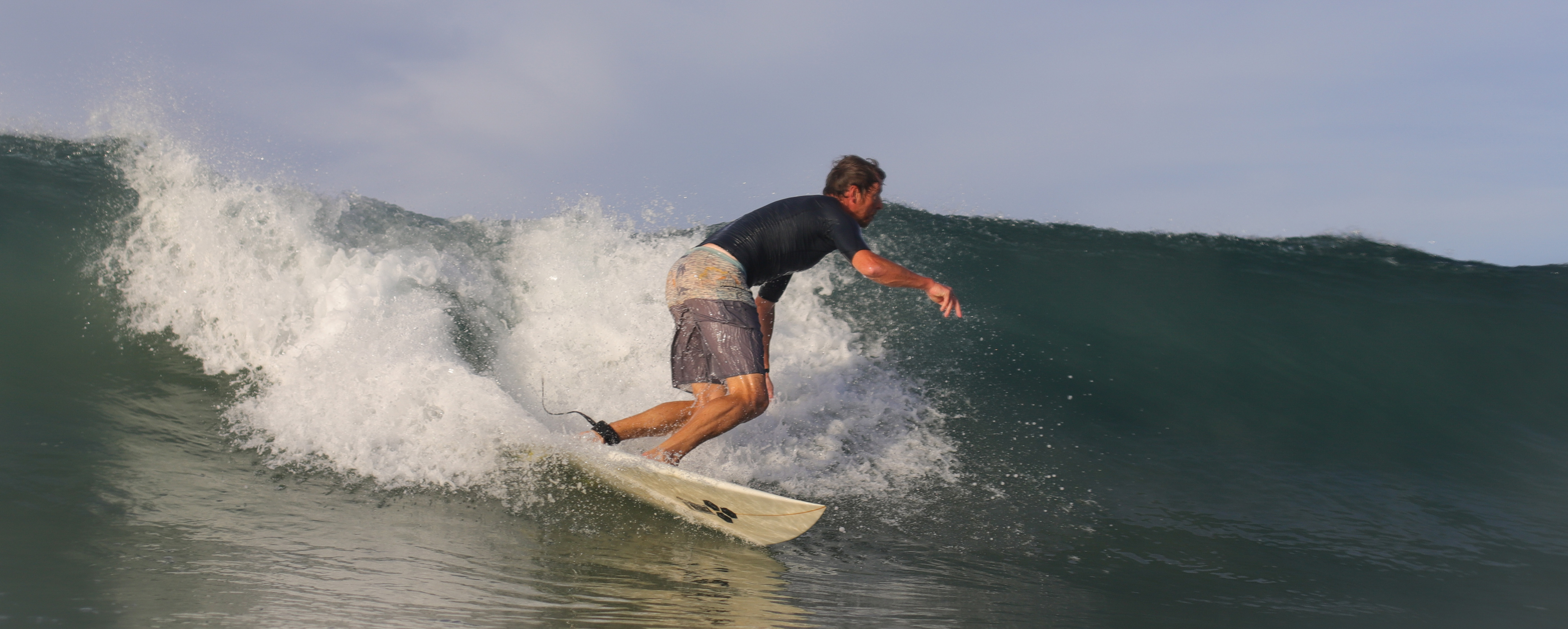 Surf coaching session on a Cornish beach