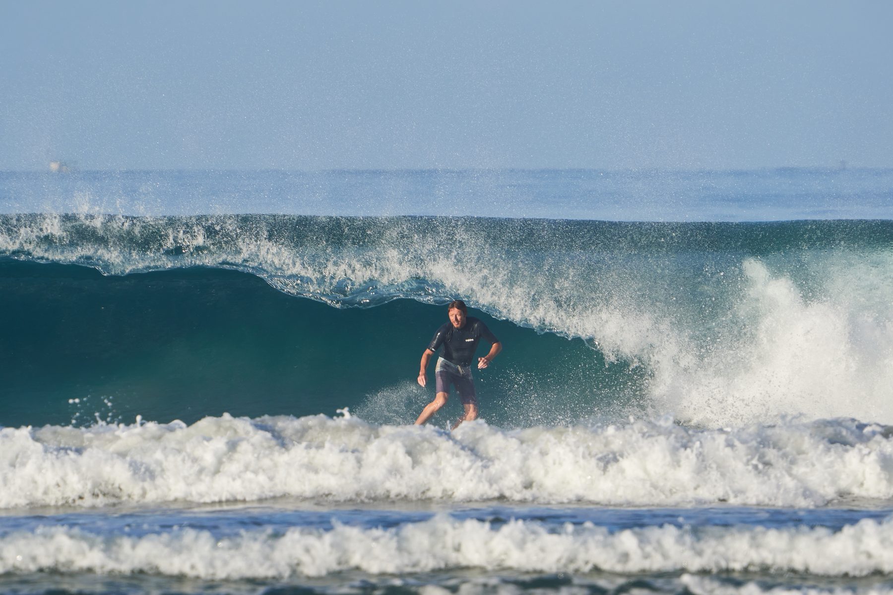 Riding along the wave face